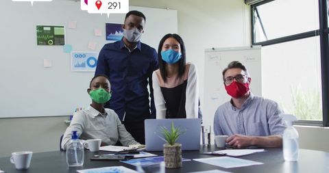 Diverse Team Wearing Masks in Modern Workspace - Download Free Stock Images Pikwizard.com