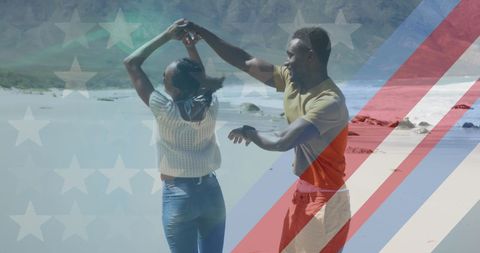 Joyful Couple Dancing on Beach with American Flag Overlay