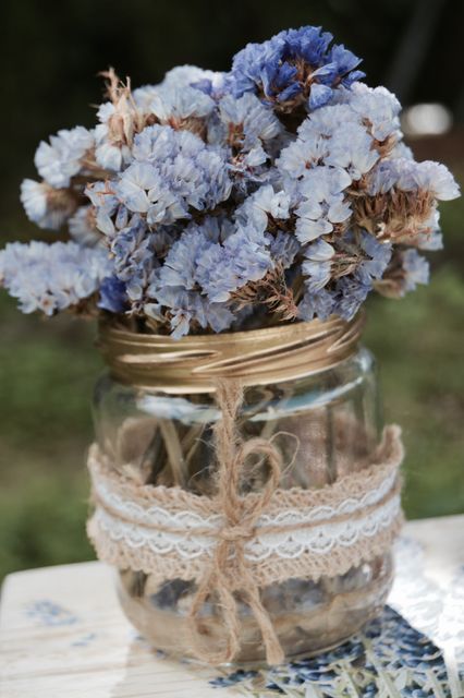 Bouquet of Blue Statice in Jar with Twine and Lace Wrap - Download Free Stock Photos Pikwizard.com