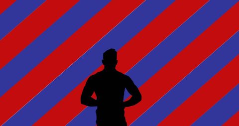 Silhouette Against Patriotic Stripes Backdrop