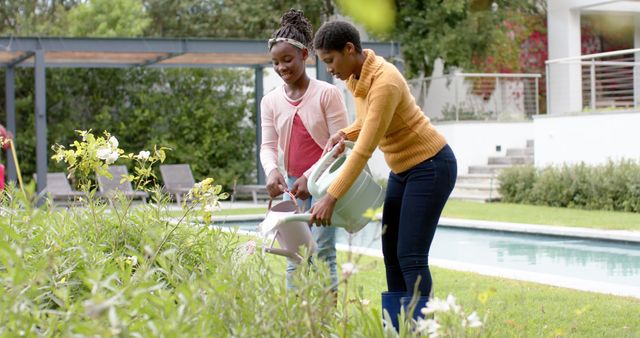 Mother and Daughter Gardening Near Pool - Download Free Stock Images Pikwizard.com