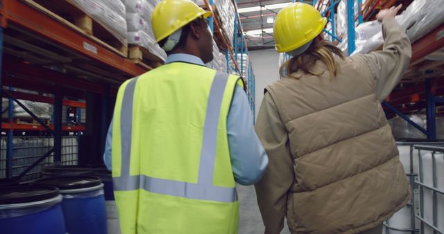 Warehouse Workers Collaborating and Inspecting Inventory - Download Free Stock Images Pikwizard.com