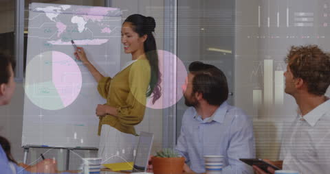 Diverse Team Analyzing Global Financial Data in Meeting