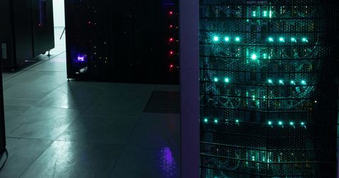 Empty Corridor in Data Center with Servers Illuminated by LED Lights - Download Free Stock Images Pikwizard.com