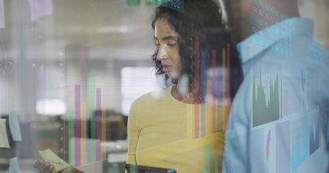 Business Professionals Analyzing Financial Data and Charts in Modern Office - Download Free Stock Images Pikwizard.com