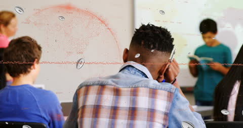 Students in Classroom Analyzing Data on Rugby Ball Performance