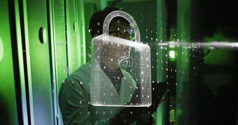 IT Engineer Understanding Data Security with Padlock Overlay - Download Free Stock Images Pikwizard.com