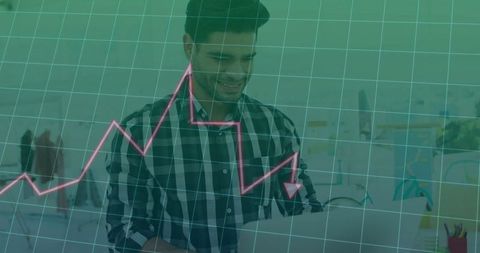 Happy professional analyzing growth graph on laptop