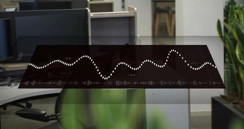 Translucent digital dashboard hud floating over open-plan office showing dotted waveform