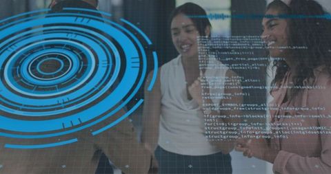 Business team collaborating around interactive HUD display and live code visualization