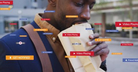 Commuter eating wrapped sandwich on urban plaza with social media notification overlays