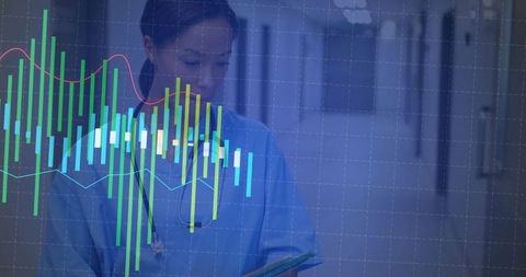 Nurse in Scrubs Reviewing Data with Overlaid Analytics Graphs