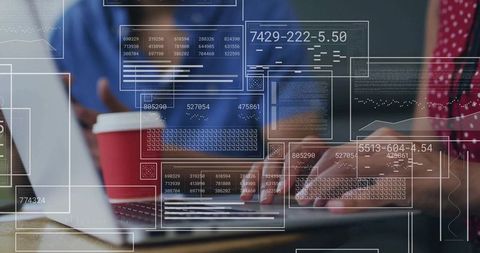 Software developers collaborating on code development in modern office