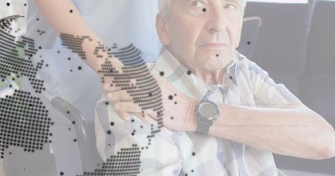 Caregiver supporting elderly in wheelchair with digital global dot-map overlay for healthcare