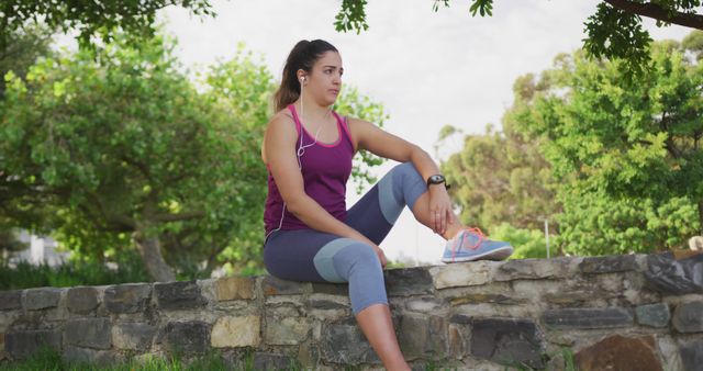 Young Woman Resting After Outdoor Workout in Park - Download Free Stock Images Pikwizard.com