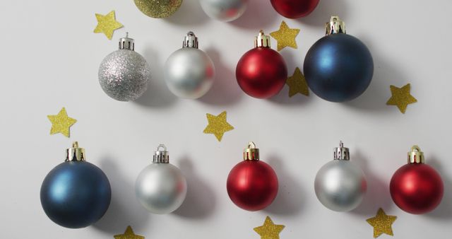 Image of christmas decorations with baubles and copy space on white background. christmas, tradition and celebration concept.