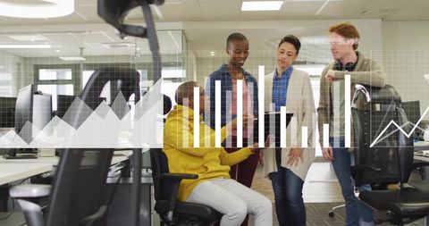 Diverse team collaborating over mobile analytics with augmented charts in modern office