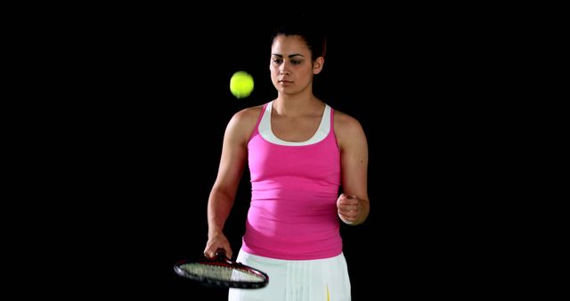 Female Tennis Player Concentrating on Ball with Racket - Download Free Stock Images Pikwizard.com