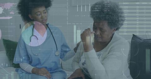 Caring nurse comforting elderly patient with empathy