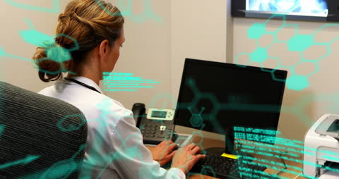 Female Lab Scientist Analyzing Data on Computer