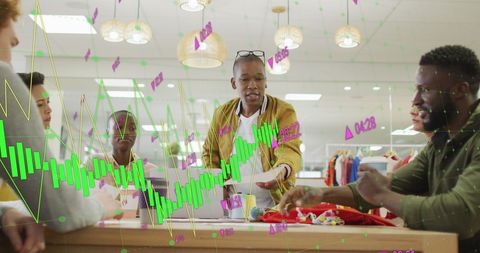 Diverse Team Analyzing Market Data in Modern Office