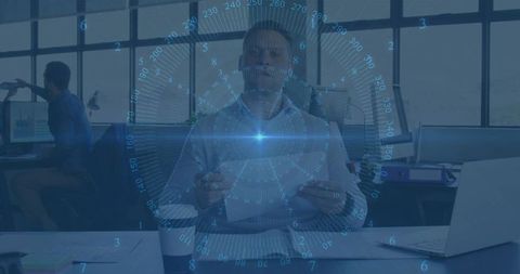 Manager Reviewing Data with Digital HUD Overlay in Open Office for Team Collaboration