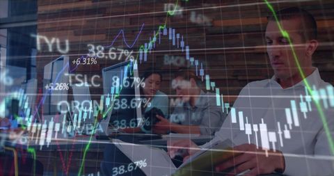 Financial professionals analysing live stock market data