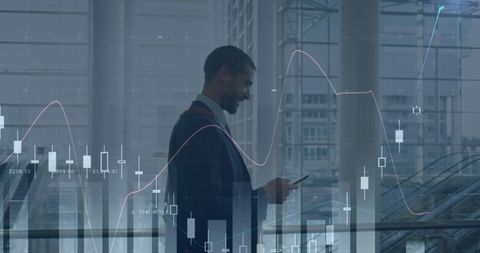 Businessman with Monitoring Financial Graphs Overlay in Modern Setting - Download Free Stock Images Pikwizard.com