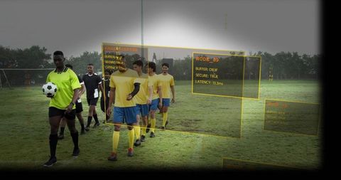 Soccer players and referee walking across wet field with augmented reality hud overlays