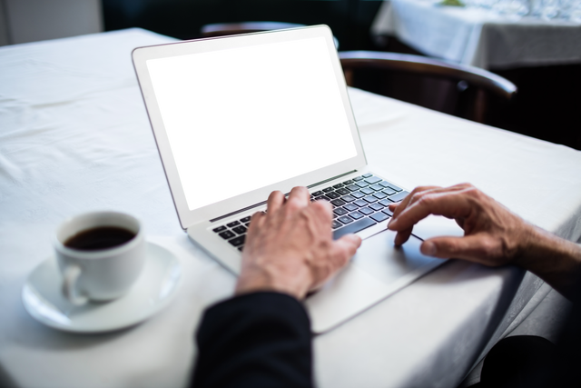 Transparent Laptop Workspace with Coffee in Background - Download Free Stock Videos Pikwizard.com