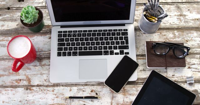 Workspace with Laptop, Tablet, Smartphone and Coffee on Rustic Wooden Table - Download Free Stock Images Pikwizard.com