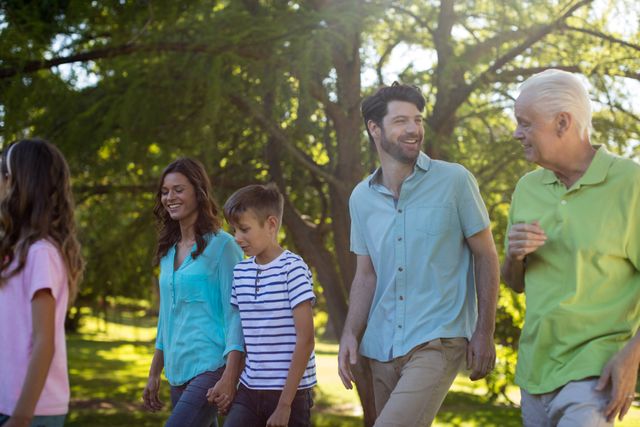 Perfect for promoting family-oriented brands, community events, outdoor activities, and health and wellness campaigns. Highlights the joy of spending quality time with loved ones in a natural setting, showcasing a harmonious multigenerational bond.