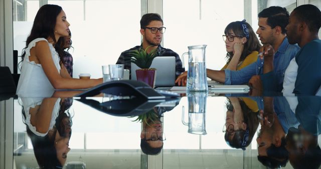 Diverse Business Team Discussing Project in Office Meeting Room - Download Free Stock Images Pikwizard.com