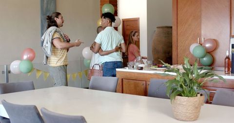 Friends Celebrating in Decorated Home Environment