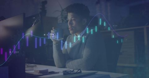 focused businessman analyzing financial data with dynamic graphics - Download Free Stock Images Pikwizard.com