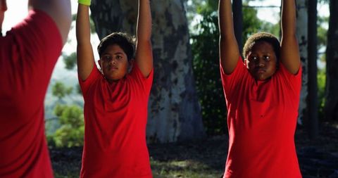 Youth Outdoor Fitness Training with Enthusiastic Coach