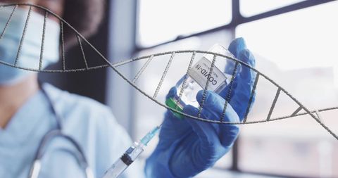 Doctor Handling Vial with Floating DNA Helix Overlay - Download Free Stock Images Pikwizard.com