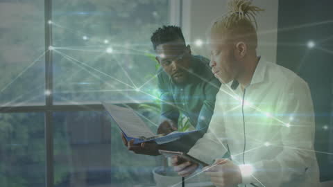 Diverse Coworkers Collaborating in High-Tech Office