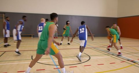 Vibrant Basketball Action in Indoor Court