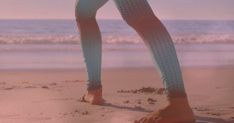 Mindful Yoga Practice on Tranquil Beach at Sunset