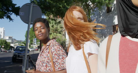 Group of Diverse Friends Enjoying a Sunny Day in the City