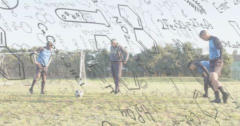 Coach guiding male soccer players training on field with tactical diagram overlay