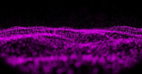 Mesmerizing Purple Particles in Hypnotic Motion on Black Background