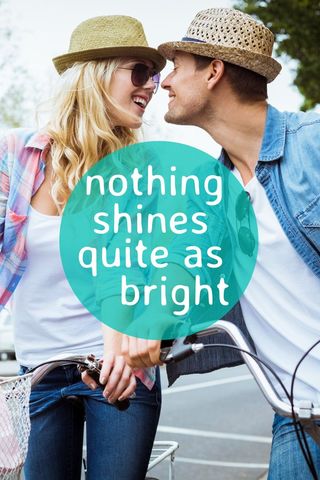 Joyful Couple on Bicycle Ride Sharing Romantic Moment Outdoors