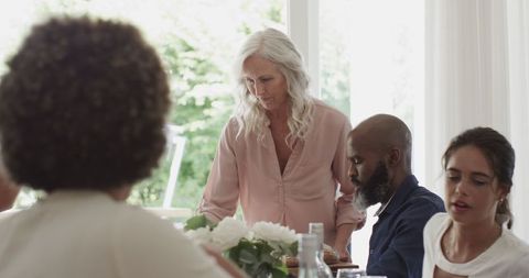 Family Celebrating Together at Wedding Lunchtime Gathering