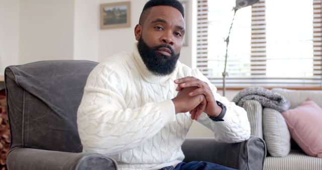 Confident African American Man Relaxing at Home - Download Free Stock Images Pikwizard.com