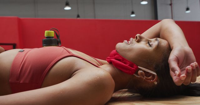 Fit Woman Resting After Intense Workout in Gym - Download Free Stock Images Pikwizard.com