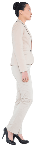 image shows asian businesswoman in beige business attire looking ahead, focusing on future opportunities or strategies in professional setting. ideal for corporate, business planning, leadership topics, marketing materials, presentations.
