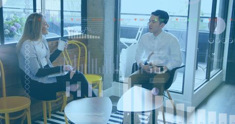 Financial Analysts in Modern Office with Digital Interface Overlay