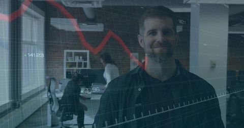 Businessman Analyzing Declining Market Trends with Analytics Overlay